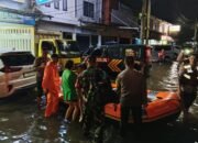 Sigap, Polisi di Tangsel Bantu Korban Banjir Karena Tugas Kemanusiaan